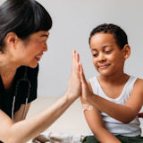 High Five pressing hands together image