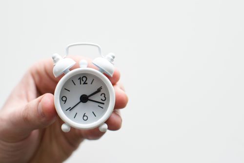 Small white alarm clock