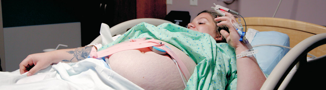 Pregnant woman being monitored Pregnant woman being monitored