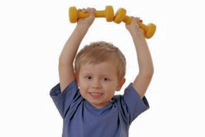 Child holding toy dumbbells above head