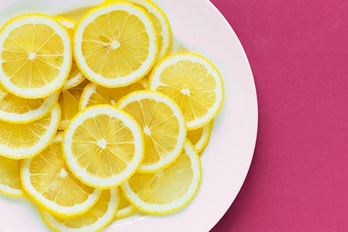 Plate of sliced lemons
