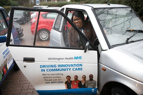 District Nurse sitting in silver car