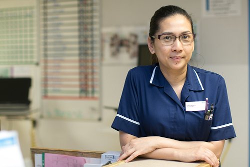Nurse with arms folded