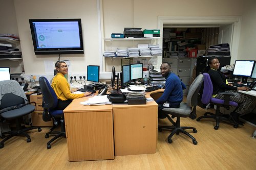 Temporary Staff Bank employees sitting at desks