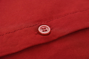 Red button on a red shirt