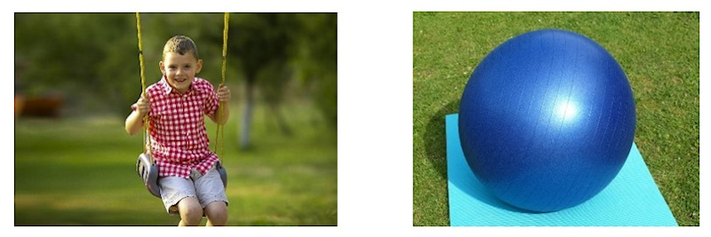 Boy on swing next to blue exercise ball Boy on swing next to blue exercise ball