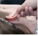Pull the earlobe image