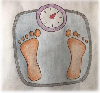 Cody the cat weighing scales image