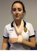 Woman in arm sling