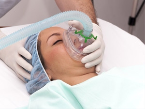 Patient with oxygen mask Patient with oxygen mask